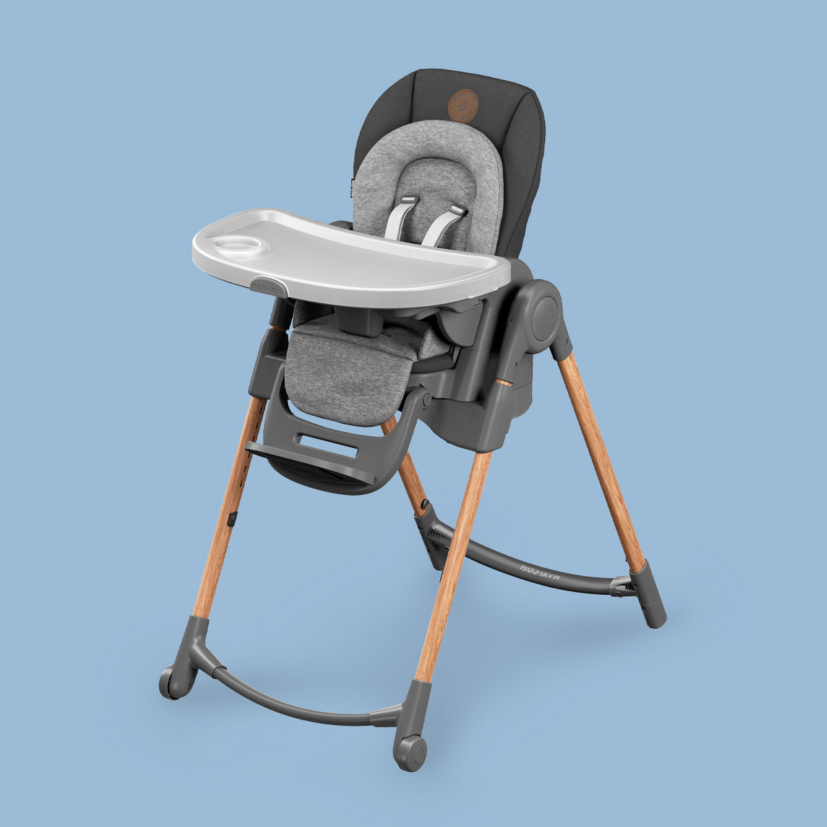 A Maxi-Cosi UAE Minla Baby High Chair on a blue background with adjustable positions.