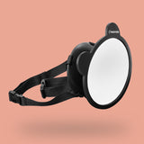 A Maxi-Cosi Back Seat Car Mirror on a pink background.