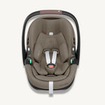 Truffle Maxi-Cosi baby car seat with black frame on a white background.