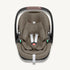 Truffle Maxi-Cosi baby car seat with black frame on a white background.