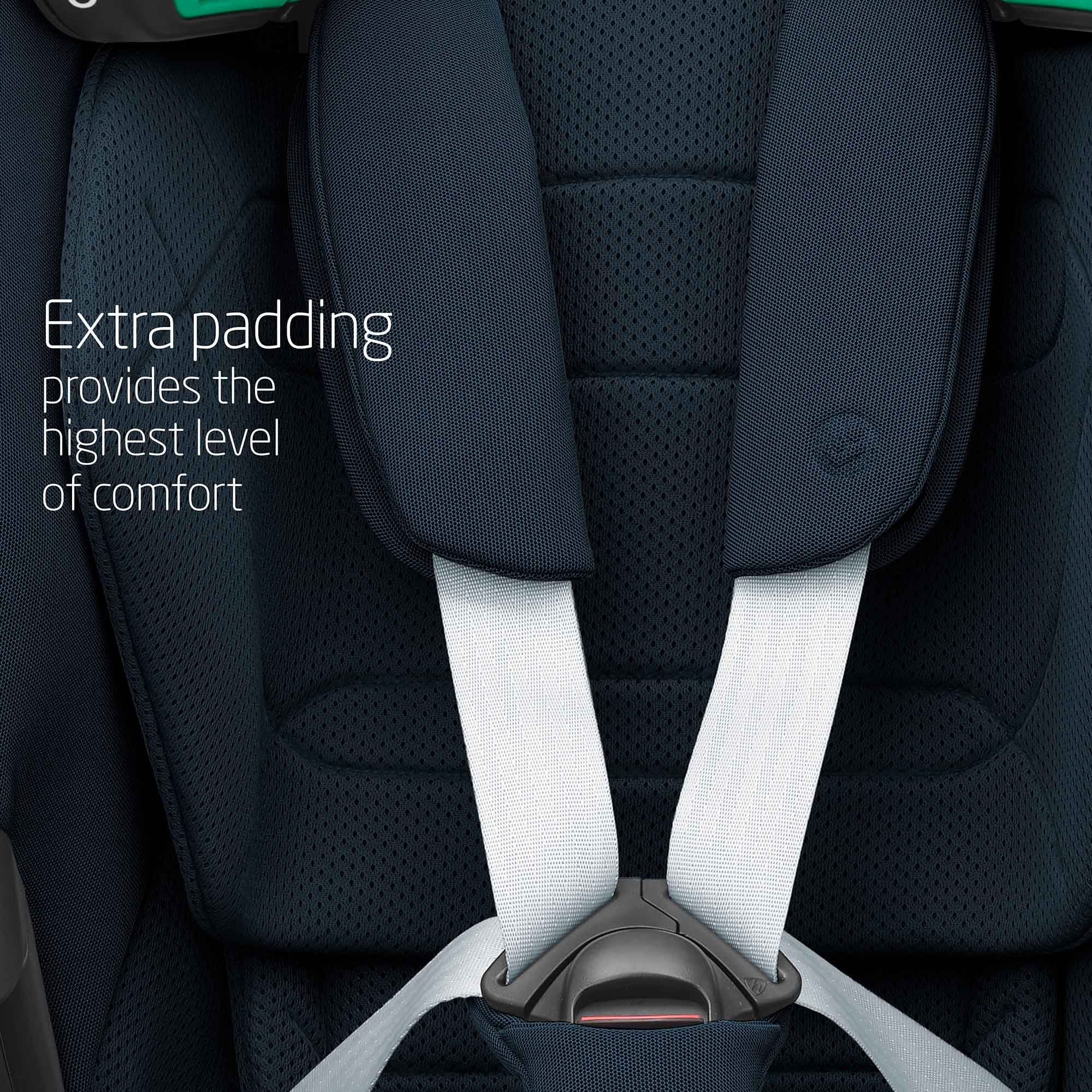 Maxi-Cosi Car seat with extra padding and visible text on a dark background.
