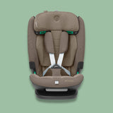 Front view of a truffle brown Maxi-Cosi Titan Pro i-Size car seat with white harness straps on a soft green background.